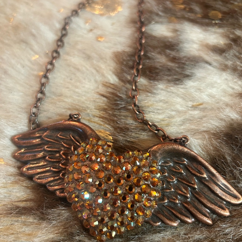 Elegant Winged Heart Necklace with copper Swarovski crystals